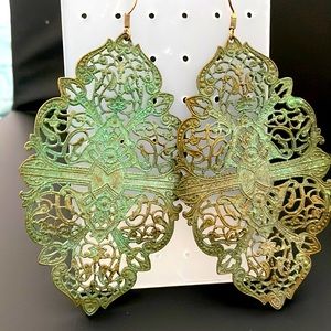 Large metal cutout leaf earrings
